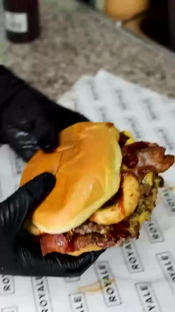 Smash burger being built at Royale
